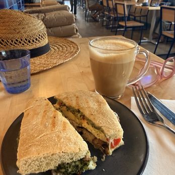 Common Good Bakery - Mediterranean breakfast sandwich and an oat milk cappuccino. Spacious indoor seating. - Bakeries Near Me - Traverse City, Michigan