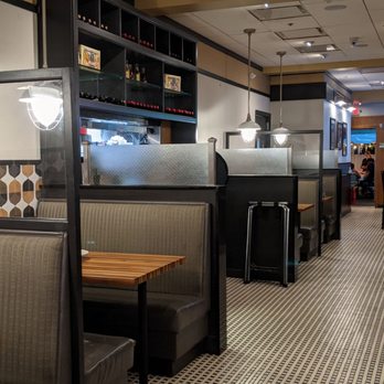Spaghettini Pizza Trattoria - Booths pictured here, parallel to the table dining so plenty of social distancing - Pizza Near Me - Mineola, New York