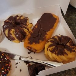 Dunkin' - Chocolate long john and crullers. Pretty pathetic spread of chocolate.