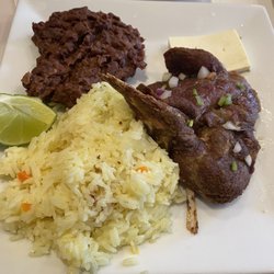 Catrachos Restaurant - Chuleta Frita-fried pork chop with rice, beans, and cheese