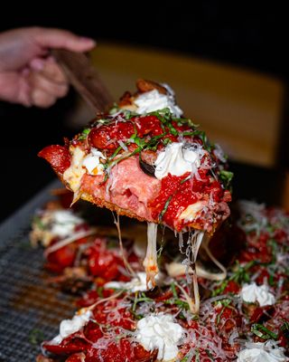 Slice of Homage Pizza by null