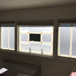 Windows are well covered before the painting starts Windows are well covered before the painting starts