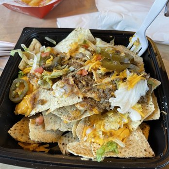 Dairy Queen - Nachos look good from the top. But in the middle there's nothing to eat but just plain chips. So disappointed. - Burgers Near Me - Kaufman, Texas Dairy Queen - Nachos look good from the top. But in the middle there's nothing to eat but just plain chips. So disappointed. - Burgers Near Me - Kaufman, Texas