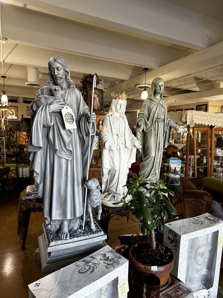 Magdalene Religious Goods and Coffee Grotto Logo