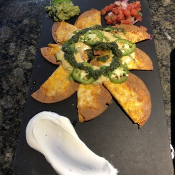 Topgolf - Nachos, it was a little strange I was expecting a pile and not like this but they were tasty. Not worth the price though - New American Near Me - Edison, New Jersey Topgolf - Nachos, it was a little strange I was expecting a pile and not like this but they were tasty. Not worth the price though - New American Near Me - Edison, New Jersey