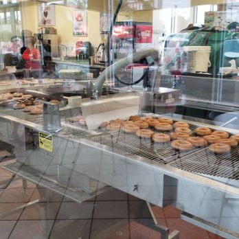 Krispy Kreme - Watching the donuts get iced - Donuts Near Me - North Myrtle Beach, South Carolina Krispy Kreme - Watching the donuts get iced - Donuts Near Me - North Myrtle Beach, South Carolina