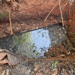 Carolina Septic Pro - Backing up septic tank with collapsed outlet line unable to leach out