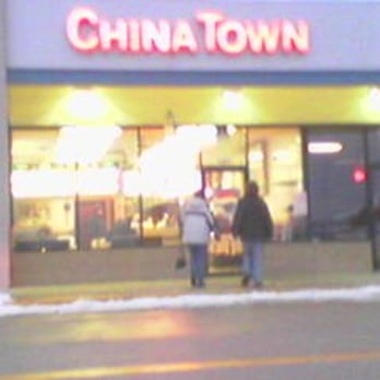 China Town - two people walking in front of a store - Chinese Near Me - McHenry, Illinois