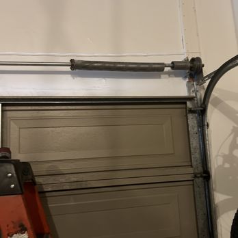 Impact Garage Doors - Broken Spring on Garage Door - Garage Door Services Near Me - Nashville, Tennessee Impact Garage Doors - Broken Spring on Garage Door - Garage Door Services Near Me - Nashville, Tennessee