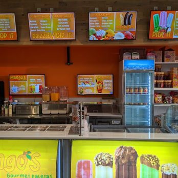 Mangos Gourmet Paletas - Inside with menu display - Ice Cream & Frozen Yogurt Near Me - Ankeny, Iowa Mangos Gourmet Paletas - Inside with menu display - Ice Cream & Frozen Yogurt Near Me - Ankeny, Iowa