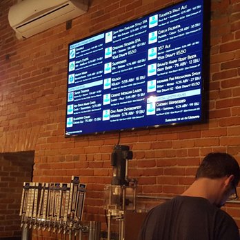 Petoskey Brewing - a man at a bar - Pubs Near Me - Petoskey, Michigan Petoskey Brewing - a man at a bar - Pubs Near Me - Petoskey, Michigan