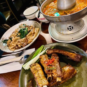 Soothr - 5. Fried Pork Ribs 14. Pad Si-Iw Noodles 1. Tom Yum Seafood Soup - Thai Near Me - New York, New York Soothr - 5. Fried Pork Ribs 14. Pad Si-Iw Noodles 1. Tom Yum Seafood Soup - Thai Near Me - New York, New York