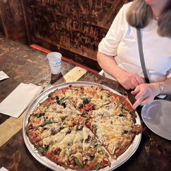 Moose's Saloon - Combo pizza with sauerkraut. Substituted spinach for the green peppers and added mushrooms. So good.