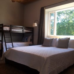 The Maine Hideaway - Pilot House Room. King bed twin bunk with private bath. Great for families.