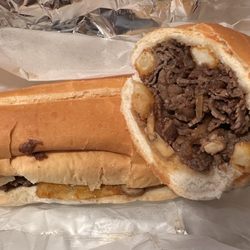 Double J Deli - The KBBQ (Sliced Steak, Sautéed Mushrooms & Onions, Korean BBQ Sauce, Spicy Fries on Garlic Roll)