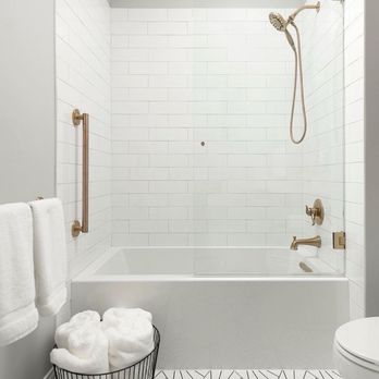 B & A Homes Remodel - a bathroom with a tub, shower, and toilet - Painters Near Me