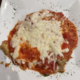 Eggplant parmigiana on Spaghetti Marinara Eggplant parmigiana on Spaghetti Marinara