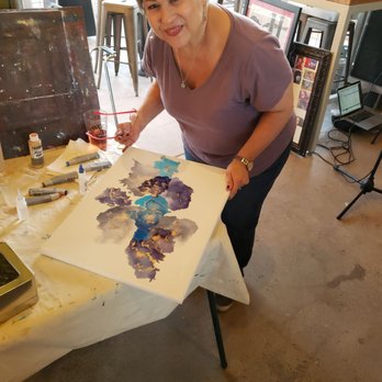 Duke City Beaches - Live artist at Artfight getting the paint on! - New American Near Me - Albuquerque, New Mexico