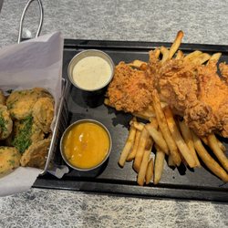 Dave & Buster's Port St. Lucie - TAKE IT CHEESEY app. Chicken strips, seasoned fries, and fried pickles.