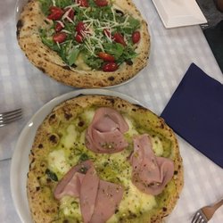 Marinato - Shrimp, tomato and arugula pizza and pistachio mortadella pizza