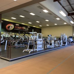 Courts Plus Fitness Center - Downstairs weights & cardio machines & indoor track