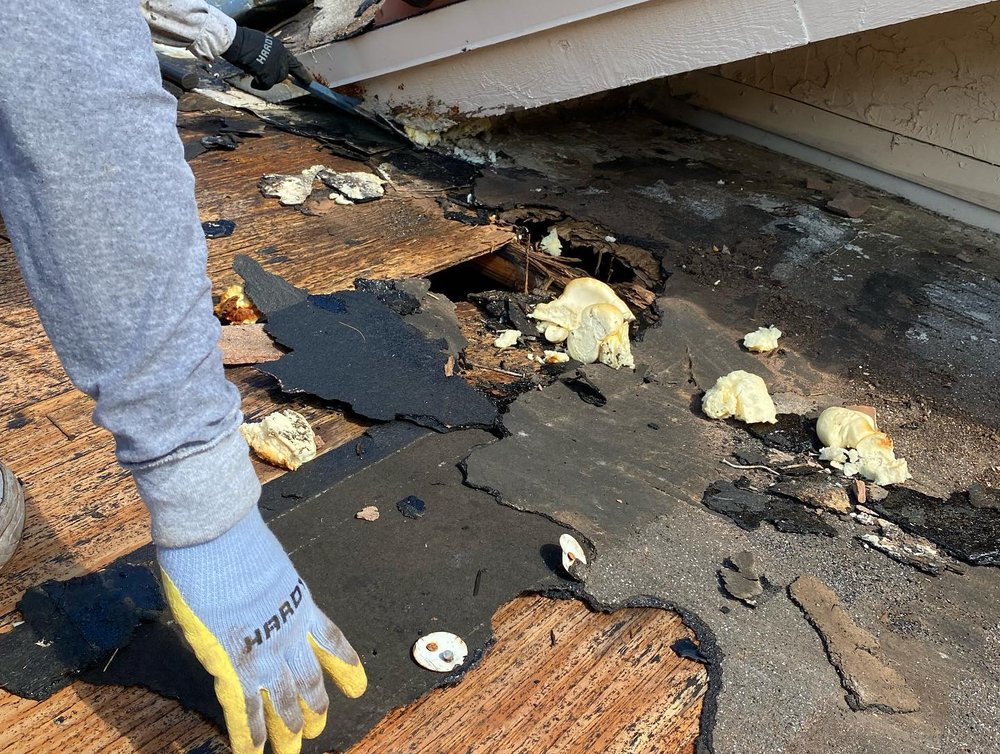 Slide of Guaranteed Roofing Solutions