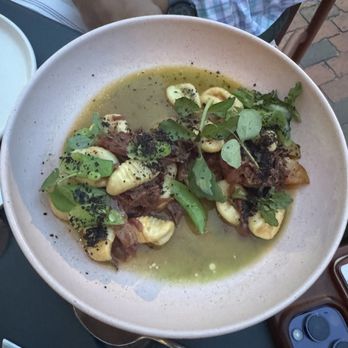 Bread & Friends - Goat Cheese Gnocchi with braised lamb and snap peas - Bakeries Near Me - Portland, Maine Bread & Friends - Goat Cheese Gnocchi with braised lamb and snap peas - Bakeries Near Me - Portland, Maine