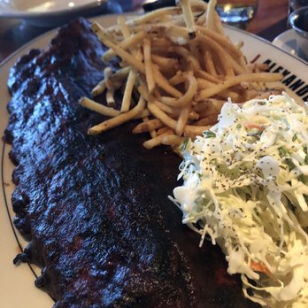 J. Alexander's - Barbecue Baby Back ribs with sweet plum creek bbq sauce served with French fries & Cole slaw - New American Near Me - Boca Raton, Florida