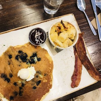 First Watch - Blueberry pancakes, breakfast potatoes, and bacon. - Breakfast & Brunch Near Me - Clayton, Missouri First Watch - Blueberry pancakes, breakfast potatoes, and bacon. - Breakfast & Brunch Near Me - Clayton, Missouri