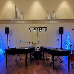 Piano Maniacs - Piano Maniacs dueling pianos set up for a fundraiser.