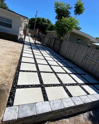 patio remodel - remodel patio with black stones and white pavers was build retaining wall around the patio.
wonderful work and great price. more information (407) 530-6593.