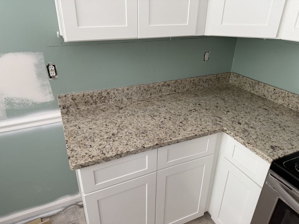 Slide of Hammerhead Roofing and Renovations