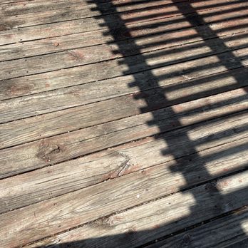 Astro Paint - the shadow of a bench on a wooden deck - Painters Near Me Astro Paint - the shadow of a bench on a wooden deck - Painters Near Me