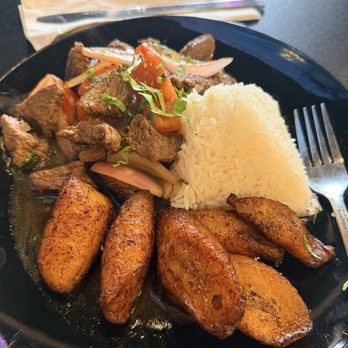Cayjo Peruvian Cuisine - LOMO SALTADO with plantains - Peruvian Near Me - Orlando, Florida Cayjo Peruvian Cuisine - LOMO SALTADO with plantains - Peruvian Near Me - Orlando, Florida