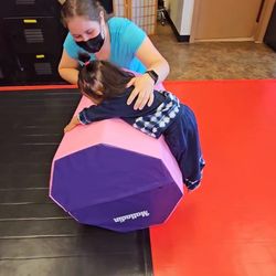 Hudson Gymnastics - One of our Baby Gymnasts practicing her rolls.