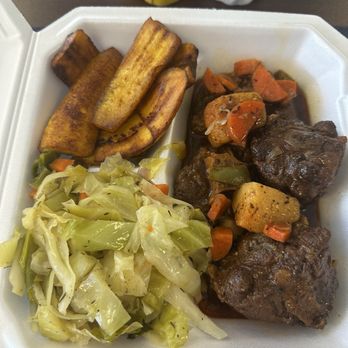 Mama Ann Restaurant - Oxtail w cabbage and plantains - Caribbean Near Me - Panama City, Florida Mama Ann Restaurant - Oxtail w cabbage and plantains - Caribbean Near Me - Panama City, Florida