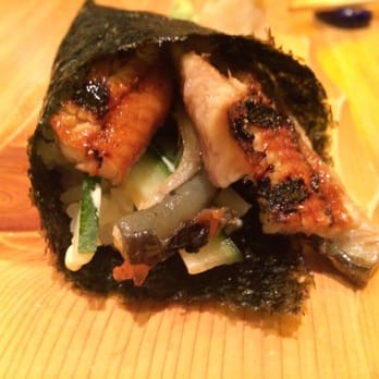 Hosokawa - Unagi hand roll. Perfectly executed! I think this +seaweed salad +glass of sparkling sake = perfect Saturday in the city lunch. - Japanese Near Me - Amsterdam, New Hampshire