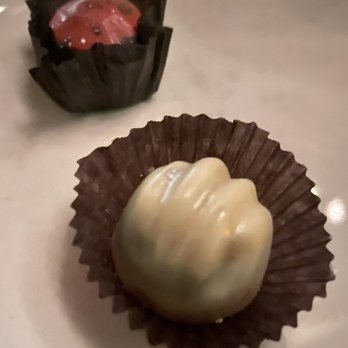 The Green Hour - A white chocolate orange vanilla cream truffle and a dark chocolate cherry cordial truffle - Cocktail Bars Near Me - Nashville, Tennessee The Green Hour - A white chocolate orange vanilla cream truffle and a dark chocolate cherry cordial truffle - Cocktail Bars Near Me - Nashville, Tennessee