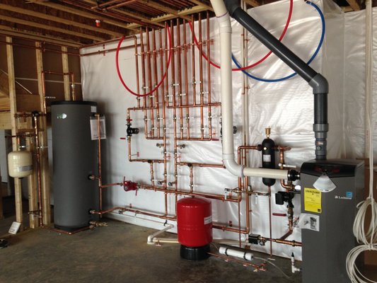 Mick's Plumbing and Heating Logo