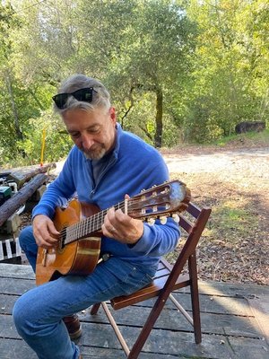 Styles - I play Classical/Spanish Guitar standards with a focus on crowd pleasing beautiful melodies. My repertoire includes: Bach, Beethoven, Carcassi, Satie, Sor, Tarrega, Villa Lobos and Vivaldi as well modern composers such as Brower, Cardosa and Sagreras.

I have a variety of arrangements of popular tunes for solo guitar. These include classic tunes by the Beatles, Nora Jones, Gordon Lightfoot, Cat Stevens and others. I also play a set of Italian classics and have been known to pick a few ragtime/blues tunes.

I enjoy playing ambient relaxing music such as Hawaiian Slack Key, as well as fingerstyle songs by Kotke, Mark Hanson and others.