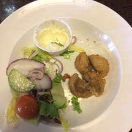 Half eaten stuffed garlic mushrooms