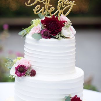 Beauty's Blossoms - Rachel delivered flowers to our bakery to create this beauty - Floral Designers Near Me