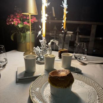 Il Mirabelle - Soufflé with chocolate sauce, Grand Marnier sauce, and whipped cream. - Italian Near Me - Rome, RM Il Mirabelle - Soufflé with chocolate sauce, Grand Marnier sauce, and whipped cream. - Italian Near Me - Rome, RM