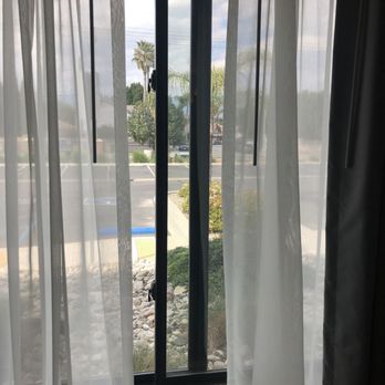 Comfort Inn & Suites - Window was open when we came in - Hotels Near Me - Colton, California Comfort Inn & Suites - Window was open when we came in - Hotels Near Me - Colton, California