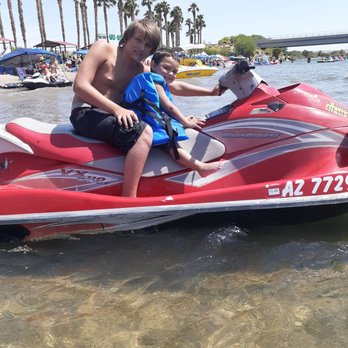 AC Watercrafts - My little brother and son sitting on the jet ski. - Jet Skis Near Me - Bullhead City, Arizona