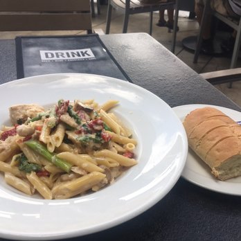 Yard House - Penne with chicken.  Mushrooms, asparagus, sun-dried tomatoes in a marsala cream sauce - New American Near Me - Tucson, Arizona