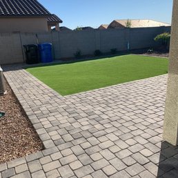Area for trash receptacles and artificial turf Area for trash receptacles and artificial turf