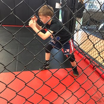 Smash Gyms - In the cage warming up -- practicing his shots. - Kickboxing Near Me - San Jose, California Smash Gyms - In the cage warming up -- practicing his shots. - Kickboxing Near Me - San Jose, California