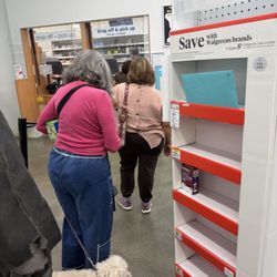 Walgreens - A line of four people that'll take about 45 minutes to an hour to get through. PLEASE DO NOT COME HERE!!!