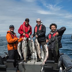 Lance Fisher Fishing - A limit of Salmon with Buoy 10 in the background.
